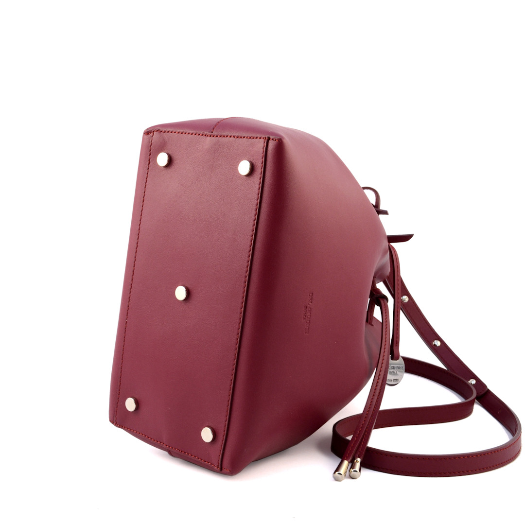 large leather bucket bag base with protective feet
