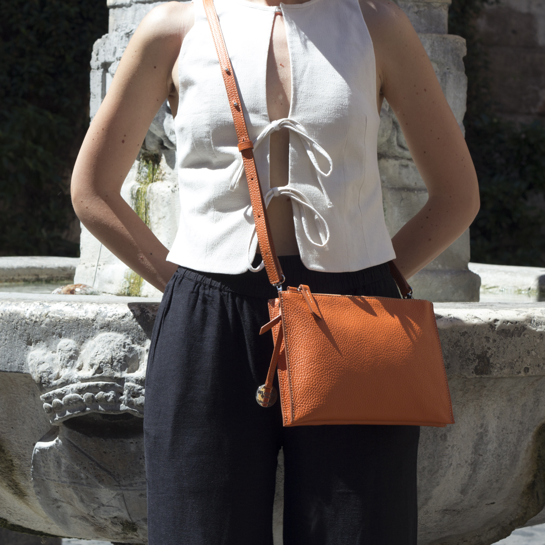 Model wearing the Italian double zip leather crossbody bag
