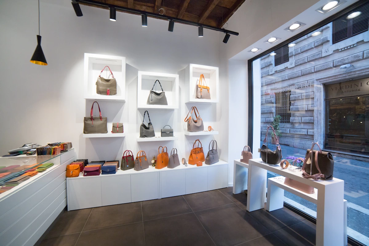 Handmade Italian leather handbag displayed at our leather goods store in Rome.